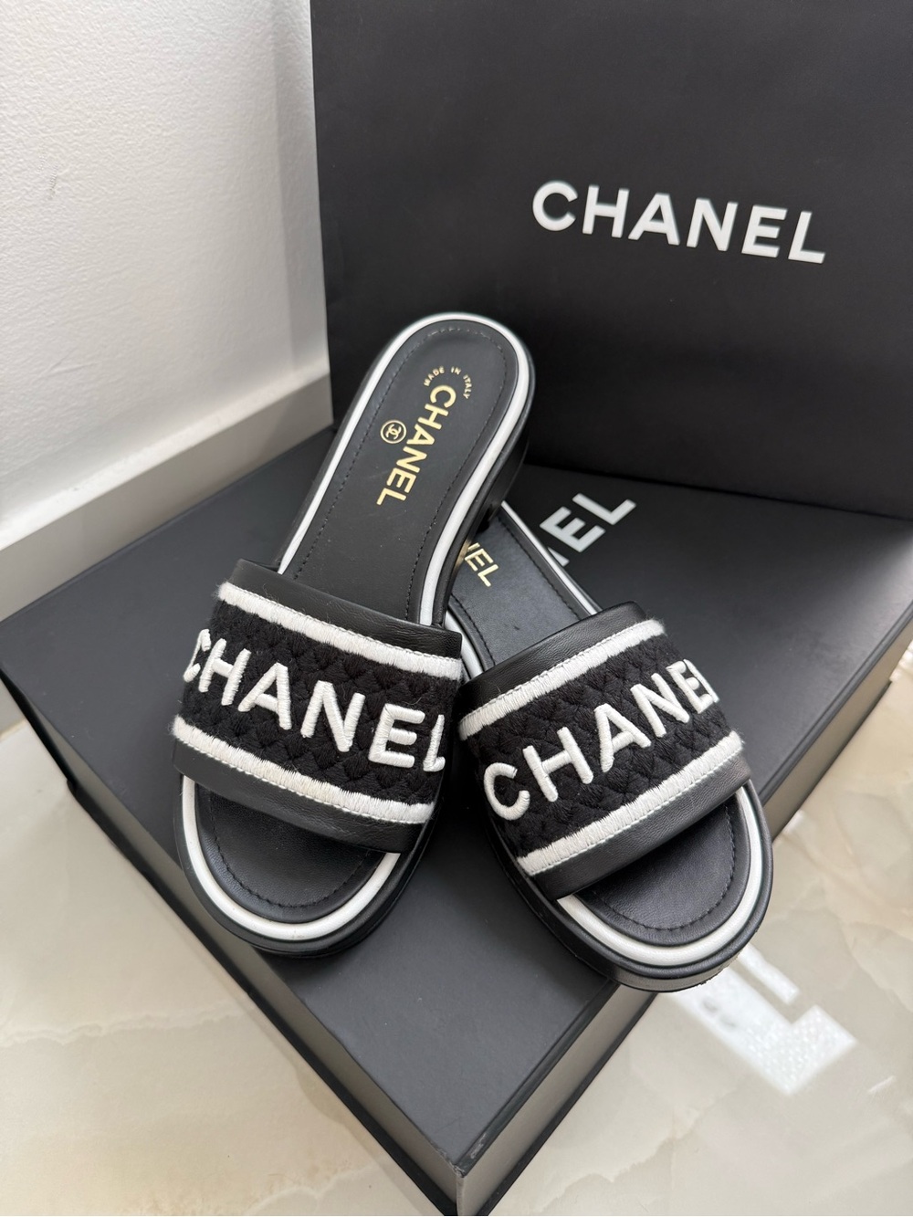 CHANEL Black & White Quilted Logo Slide Mules